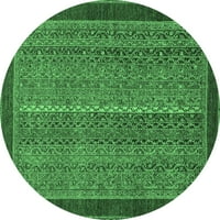 Ahgly Company u zatvorenom okruglom sažetkom smaragdno zelene moderne prostirke, četvorono