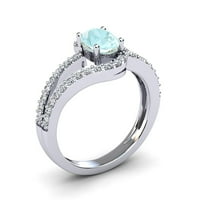 Superjeweler 1. Karat ovalnog oblika akvamarine i maštoviti dijamantni prsten u srebru u sterlingu za