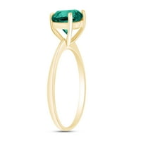 Smješten simulirani smaragd može simulirani maževiti piling SOLITAIRE prsten u 14K žutom zlatu preko