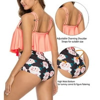 Bikini ruffle ispisuje trbuh i pokazuje tanke podijeljene kupaćim kostima