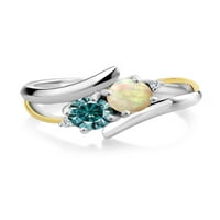 Gem Stone King srebrna i 10k žuti zlatni prsten okrugli Cabochon Bijeli etiopski Opal i Vivid Blue Moissine
